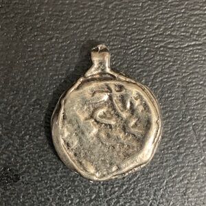 Silver Ancient coin pendant.
